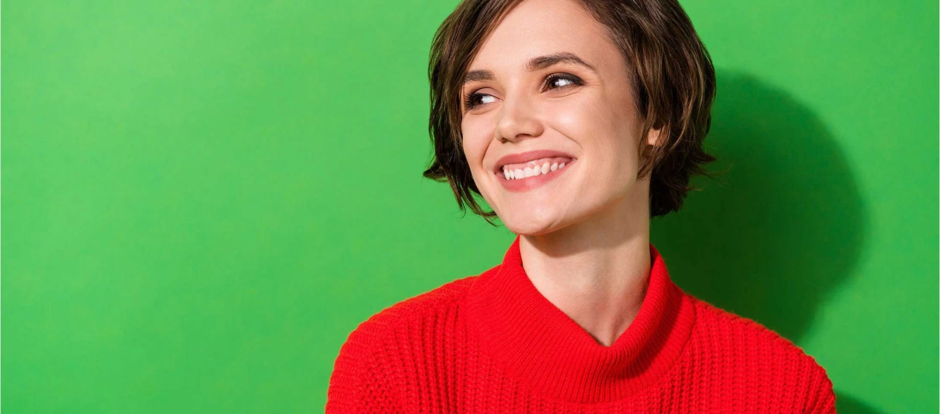Smiling customer against DAP green background